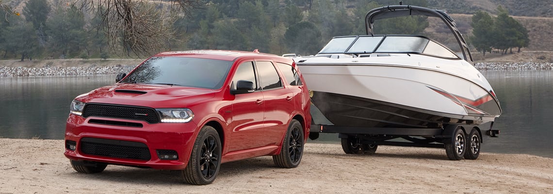 2022 Dodge Durango SUV front view towing boat