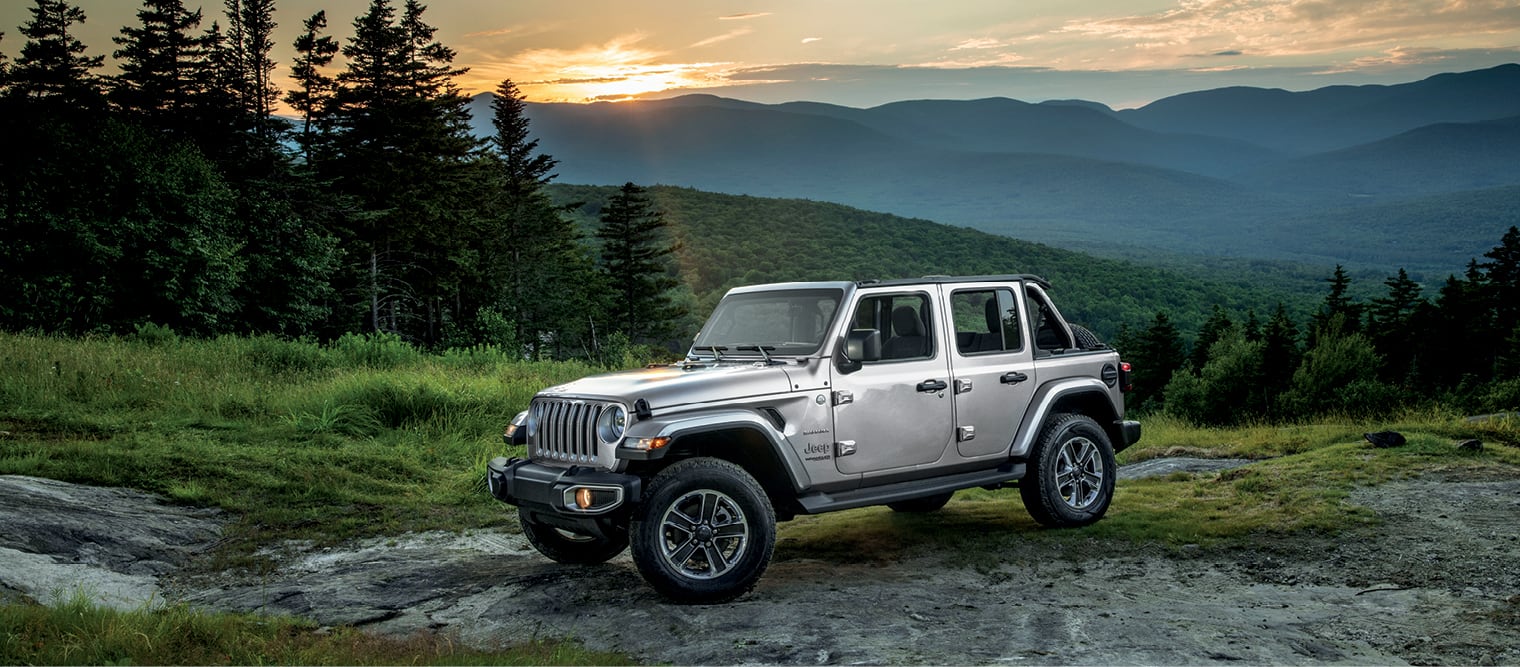 2022 Jeep Wrangler off-road in silver with top off