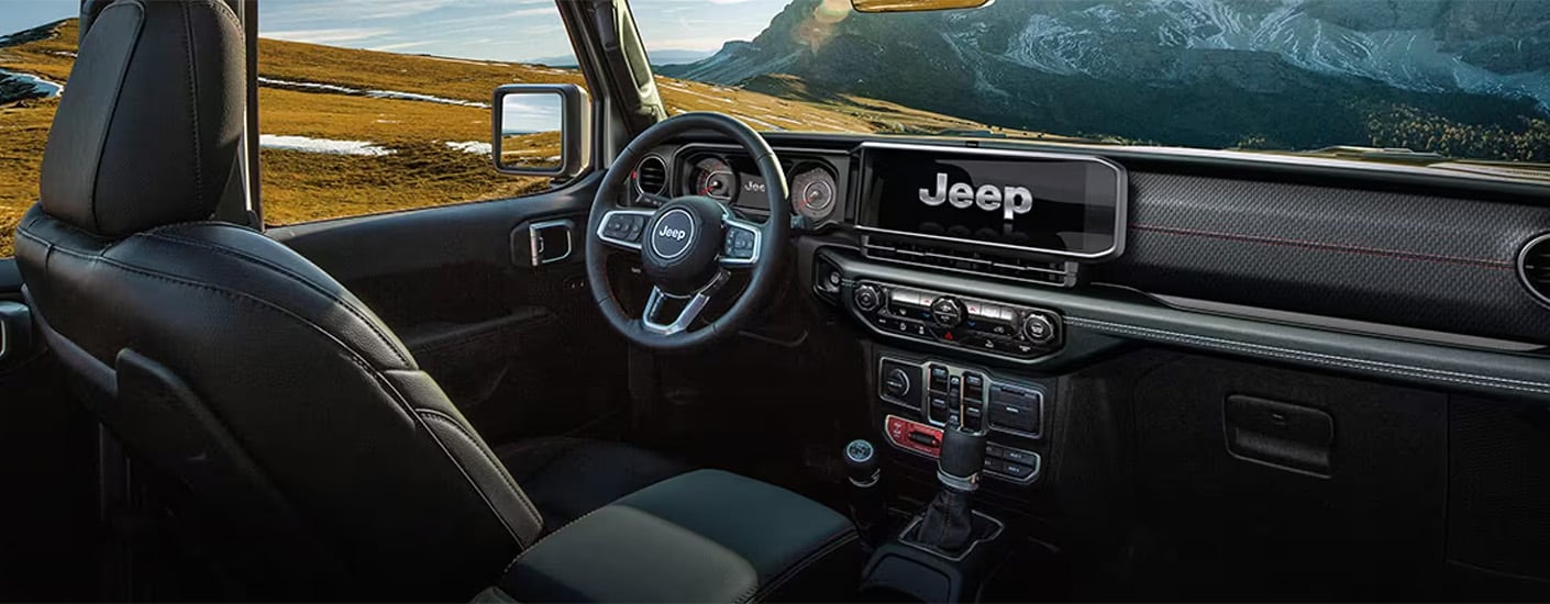 New 2024 Jeep Wrangler SUV, interior dashboard with large infotainment screen
